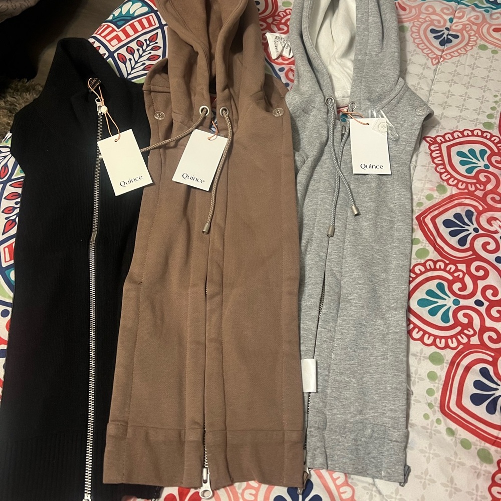 Quince Trio of Black, Tan, and Gray Hooded Vests